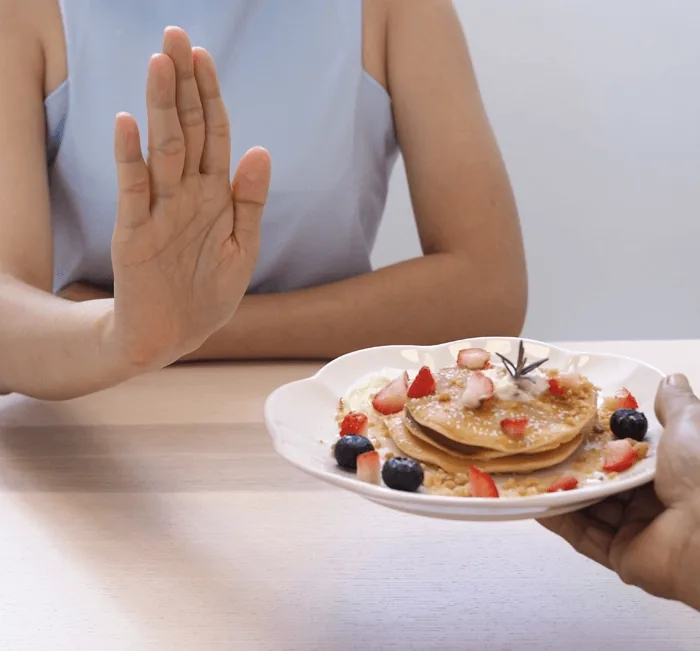 Declining a slice of cake